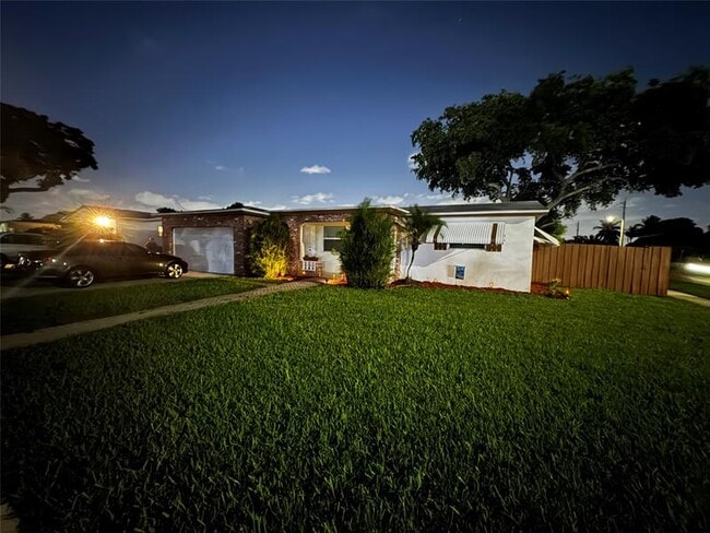 property at 6598 NW 4th St