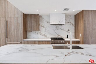 1033 Carol Dr in West Hollywood, CA - Building Photo - Building Photo