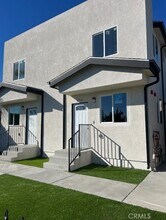 411 E 99th St in Los Angeles, CA - Building Photo - Building Photo