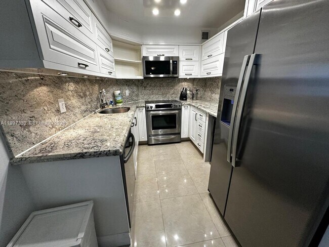 property at 5225 Collins Ave