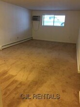 71 Montvale Ave-Unit -18 in Stoneham, MA - Building Photo - Building Photo