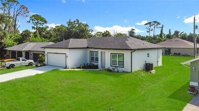 2054 Kendis St in Port Charlotte, FL - Building Photo - Building Photo