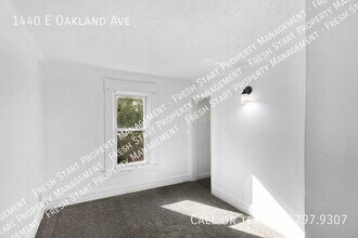 1440 E Oakland Ave in Lansing, MI - Foto de edificio - Building Photo