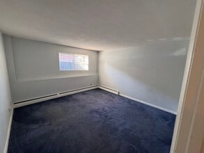 25 Arlington Rd, Unit Apt 1-1 in Woburn, MA - Foto de edificio - Building Photo