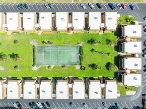 1400 Pompei Ln in Naples, FL - Building Photo - Building Photo