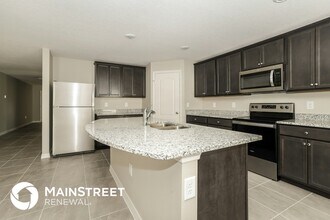 123 Violet Ct, Unit 3210 in Poinciana, FL - Building Photo - Building Photo