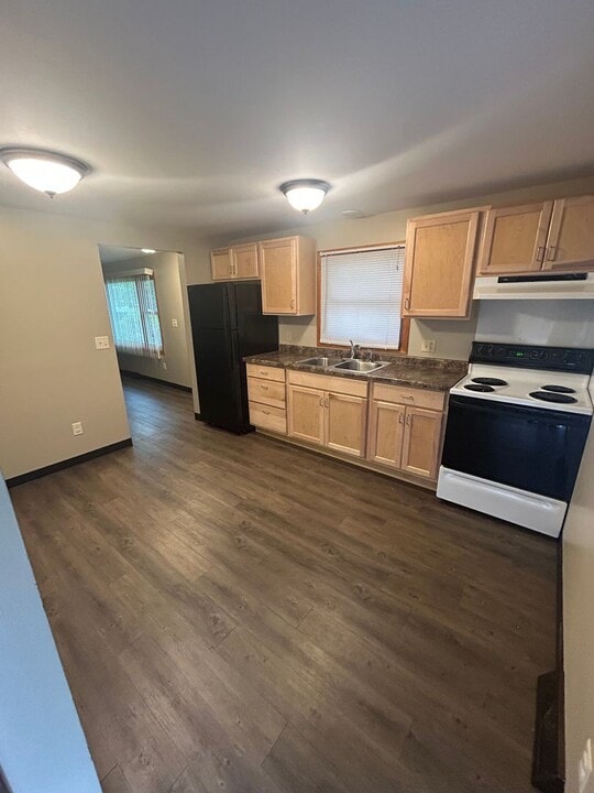703-705 Woodbine Dr in Merrill, WI - Building Photo