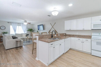 210 Cherie Down Ln in Cape Canaveral, FL - Building Photo - Building Photo