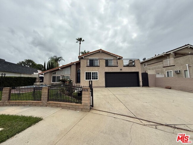 8828 Dempsey Ave in Los Angeles, CA - Building Photo - Building Photo