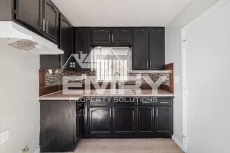 5547 Holmes Ave in Los Angeles, CA - Building Photo - Building Photo