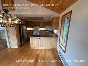 7205 SW Burl Dr in Waldport, OR - Building Photo - Building Photo