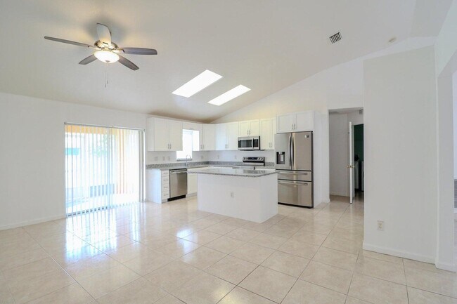 3631 SW Kasin St in Port St. Lucie, FL - Building Photo - Building Photo