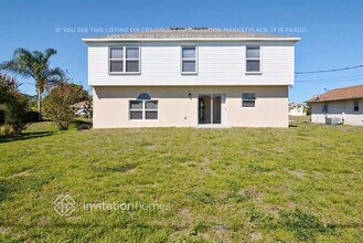 1002 SW Liberty Ave in Port St. Lucie, FL - Building Photo - Building Photo