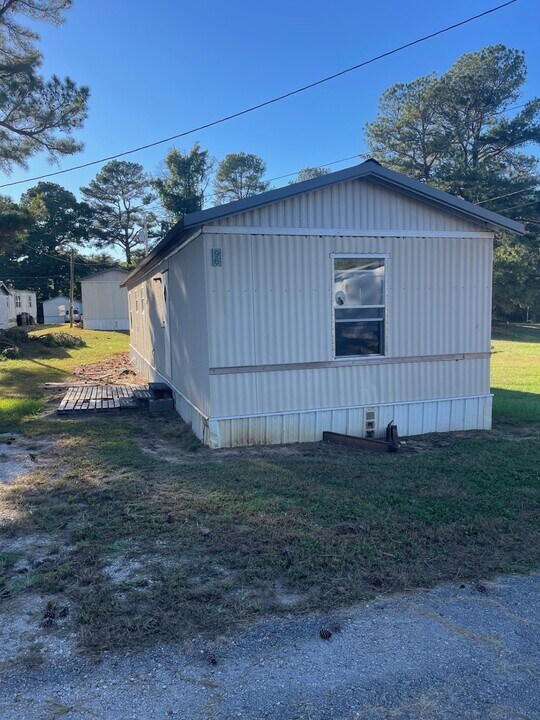 96 Fowler Cir in Hollow Rock, TN - Building Photo