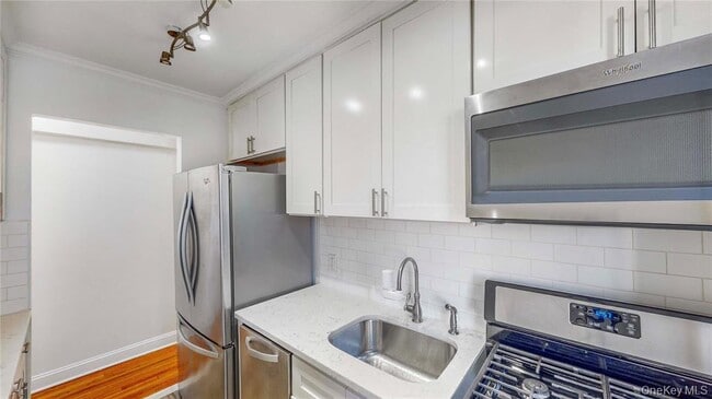 property at 66-15 Wetherole St