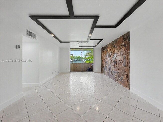 property at 8411 NW 8th St