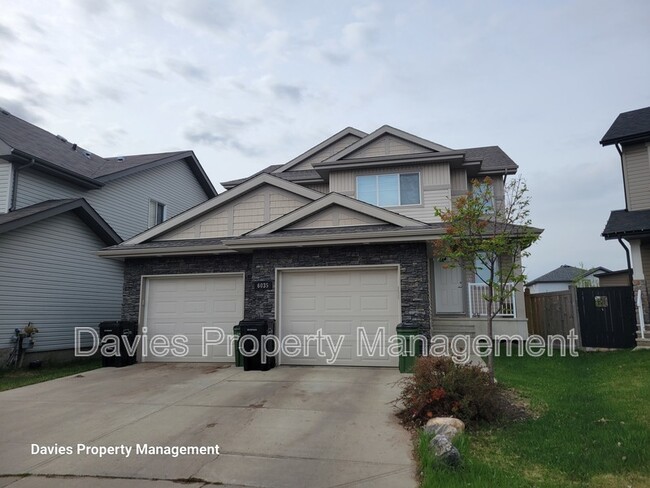 property at 6035-6034 4 Ave SW