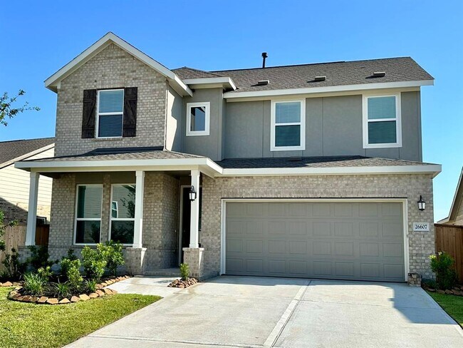 property at 26607 Woodland Strawberry Ln