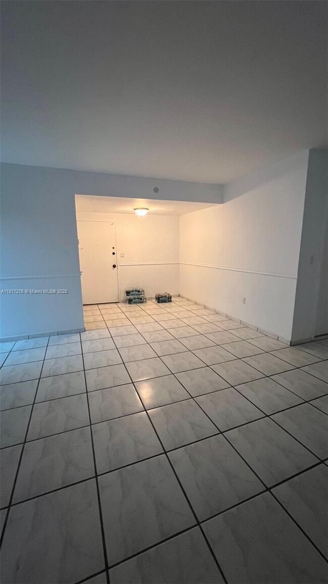 property at 5825 Collins Ave