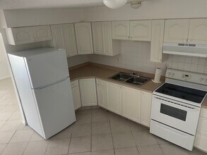 135 Lincoln Rd NE, Unit 135 in Lake Placid, FL - Foto de edificio - Building Photo