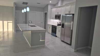 661 Myra Ln NW in Port Charlotte, FL - Building Photo - Building Photo