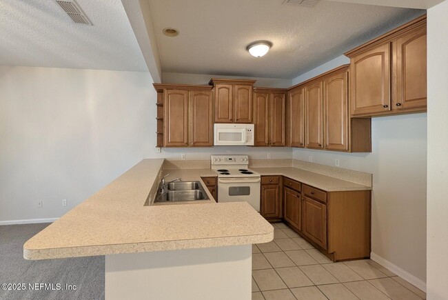 5815 Parkstone Crossing Dr in Jacksonville, FL - Building Photo - Building Photo