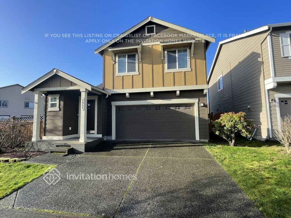 6947 Breeze Dr SE in Lacey, WA - Foto de edificio