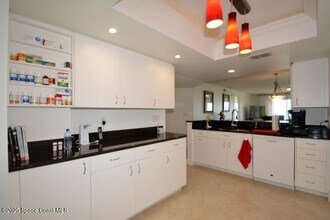 8700 Ridgewood Ave in Cape Canaveral, FL - Foto de edificio - Building Photo