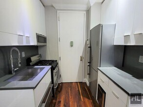 East 50th Street, Unit 2B in New York, NY - Building Photo - Building Photo