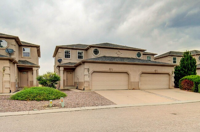 Updated Townhome Near Fort Carson with Unm... in Colorado Springs, CO - Building Photo - Building Photo