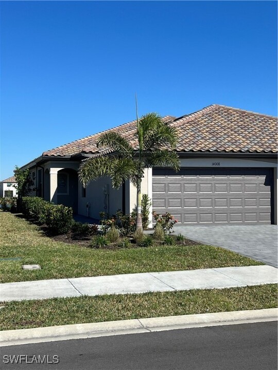 14008 Hunter Oak Dr in Miromar Lakes, FL - Building Photo