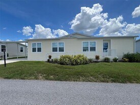 12116 County Rd 769 in Lake Suzy, FL - Building Photo