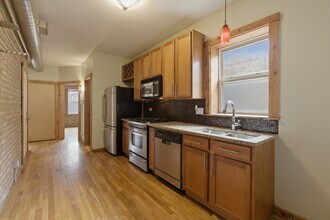 4104 N Mozart St, Unit 1E in Chicago, IL - Building Photo - Building Photo