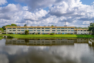 Chalet on the Lake in St. Petersburg, FL - Building Photo - Building Photo