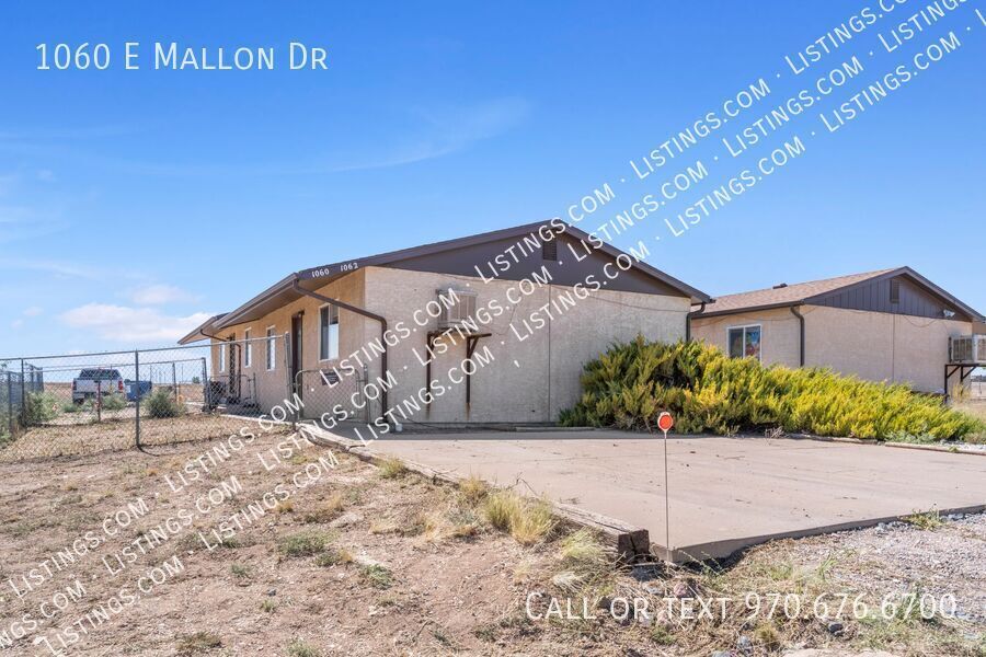 1060 E Mallon Dr in Pueblo West, CO - Building Photo