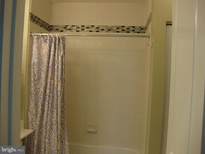 12919 Alton Square-Unit -404 in Herndon, VA - Building Photo - Building Photo