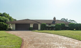 5855 Whispering Ln in Titusville, FL - Building Photo
