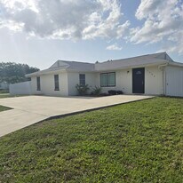 1285 SE Port St Lucie Blvd in Port St. Lucie, FL - Building Photo