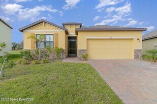 1883 Farmhouse Rd SE in Palm Bay, FL - Building Photo