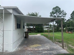 21818 Virginia Dr in Astor, FL - Building Photo - Building Photo