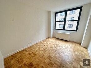 EAST 49 STREET in New York, NY - Building Photo - Building Photo