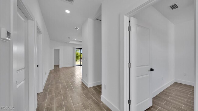 1121 Hightower Ave S in Lehigh Acres, FL - Building Photo - Building Photo