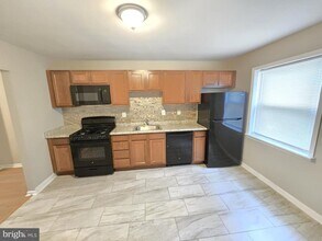 1207 E Lanvale St in Baltimore, MD - Building Photo - Building Photo