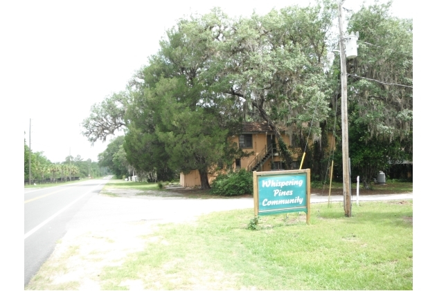 Whispering Pines Community in Melrose, FL - Building Photo