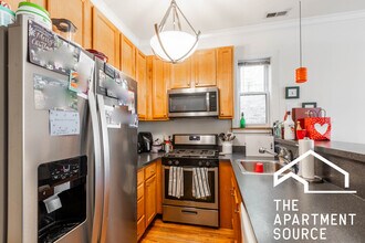 1314 W Roscoe St, Unit 1 in Chicago, IL - Foto de edificio - Building Photo