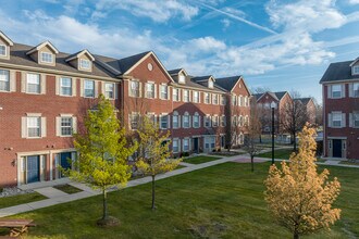 Midtown Brownstones in Taylor, MI - Building Photo - Building Photo