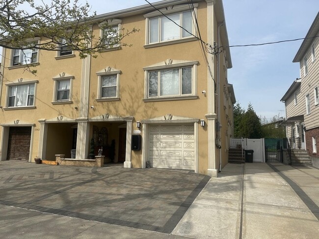 property at 15-60-60 209th St