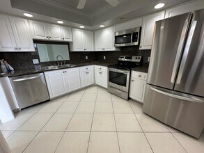 250 John F Kennedy Dr, Unit Ph7 in Atlantis, FL - Building Photo - Building Photo