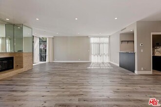 323 N Palm Dr in Beverly Hills, CA - Building Photo - Building Photo