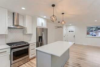 4090 W Wagon Trail Dr in Littleton, CO - Building Photo - Building Photo